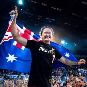 Tia-Clair Toomey holding the Australian flag. How I Became the Fittest Woman on Earth: My Story So Far by Tia-Clair Toomey. ISBN: 978-0-646-98727-9