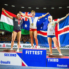 Load image into Gallery viewer, Tia-Clair Toomey on top of the CrossFit Games podium as the Fittest Woman On Earth holding the Australian flag. How I Became the Fittest Woman on Earth: My Story So Far by Tia-Clair Toomey. ISBN: 978-0-646-98727-9